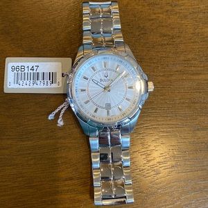 Bulova men’s watch. New in box, never worn. Brand new batteries.